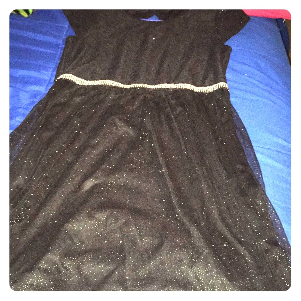 It’s a beautiful black with white glitter dress